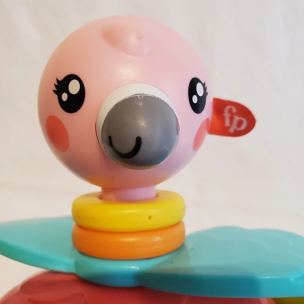Fisher Price Paradise Pals Flamingo Roll A Round Rainbow Smile Face Pull Toys